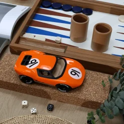 Oranje racewagen - Ken Gibson